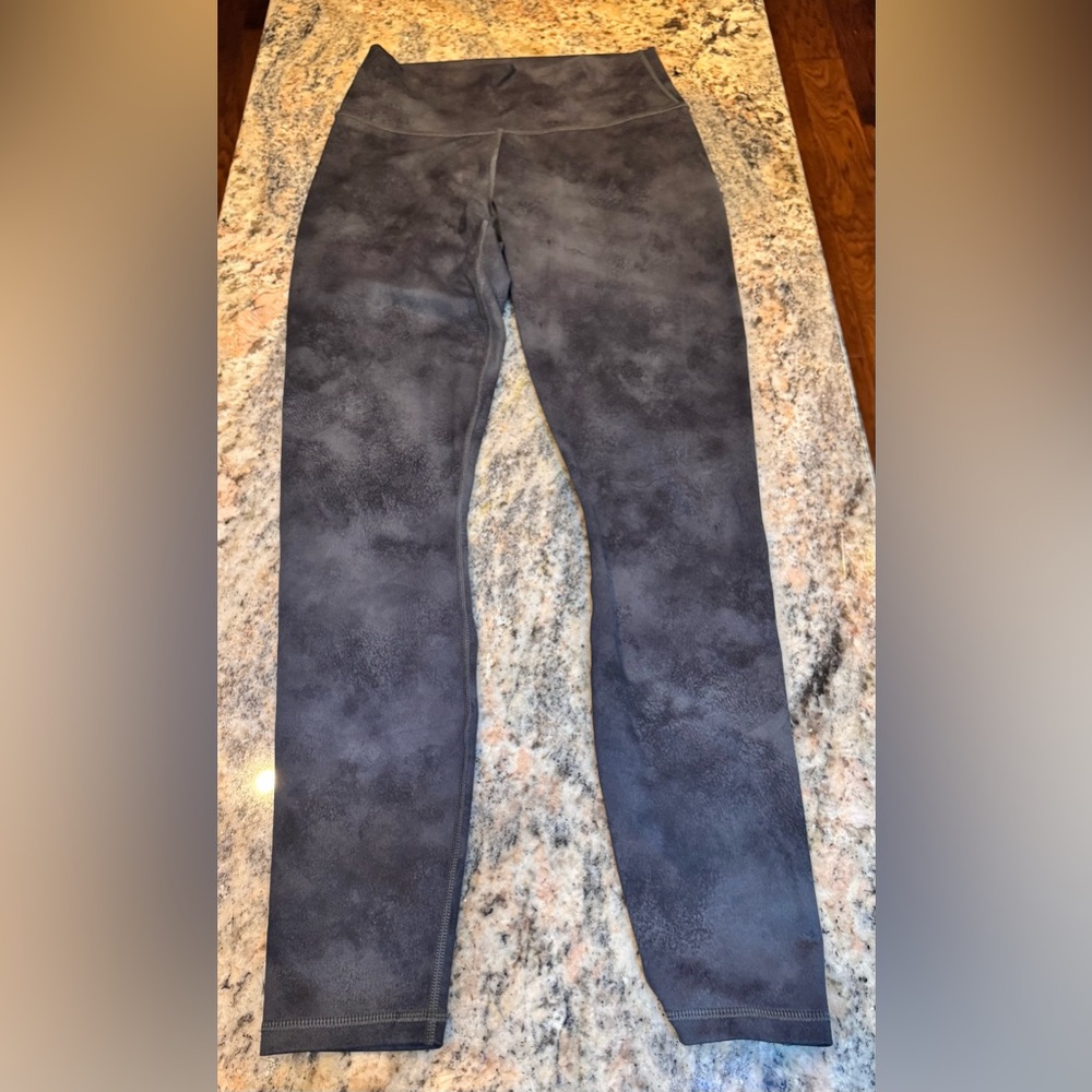 Fabletics PowerHold Leggings. Black and gray marbled design.